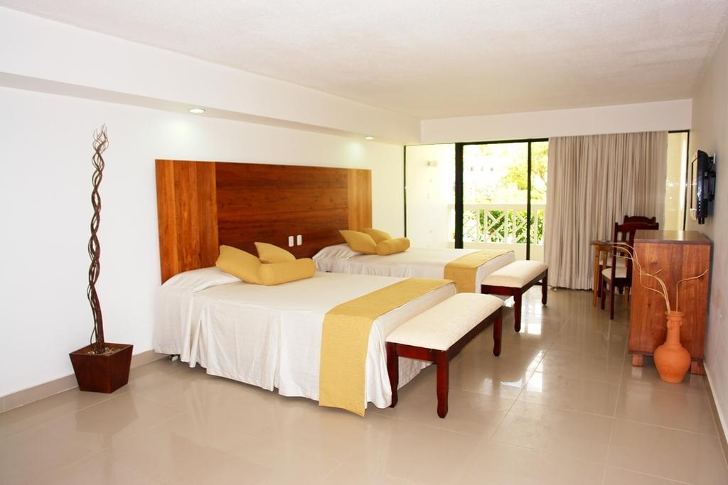Emotions By Hodelpa Puerto Plata Hotel Værelse billede